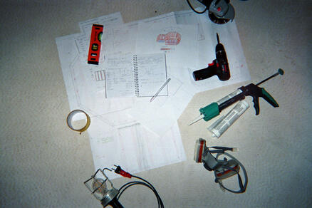 Picture of the plans and the tools used for the construction.