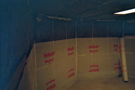 Putting up the SIGA Majpel vapor barrier.